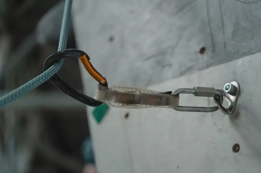 Close-up of active climbing protection, spring-loaded camming devices and passive nuts